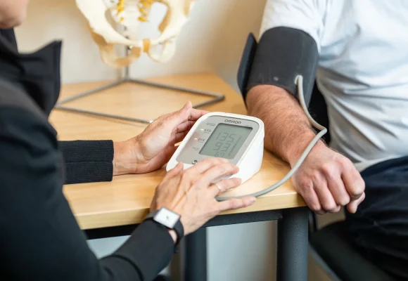 Close-up of a blood pressure monitor during a workplace health check