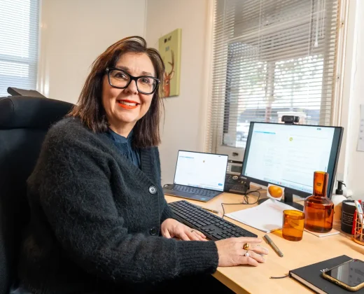 Rehab Co consultant providing job seeking and resume support at a desk